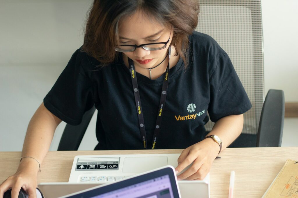woman looking at laptop